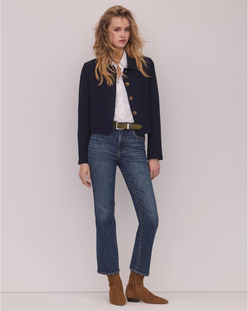 Veronica Beard Blue denim high-rise slim-fit jeans.