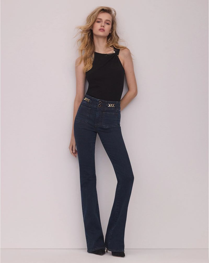 Veronica Beard Black ribbed knit top with pearl button detail.