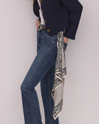 Veronica Beard Blue denim jeans with orange stitching.