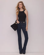 Veronica Beard Black suede handbag with gold braided handle.