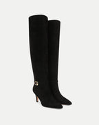 Veronica Beard Black suede knee-high boots with gold buckle.