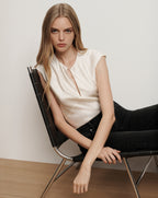 Veronica Beard White satin sleeveless blouse with keyhole neckline.
