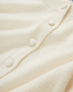 Veronica Beard Cream-colored knit cardigan with matching buttons.