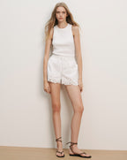 Veronica Beard White ribbed tank top and white eyelet lace shorts with a drawstring waist.