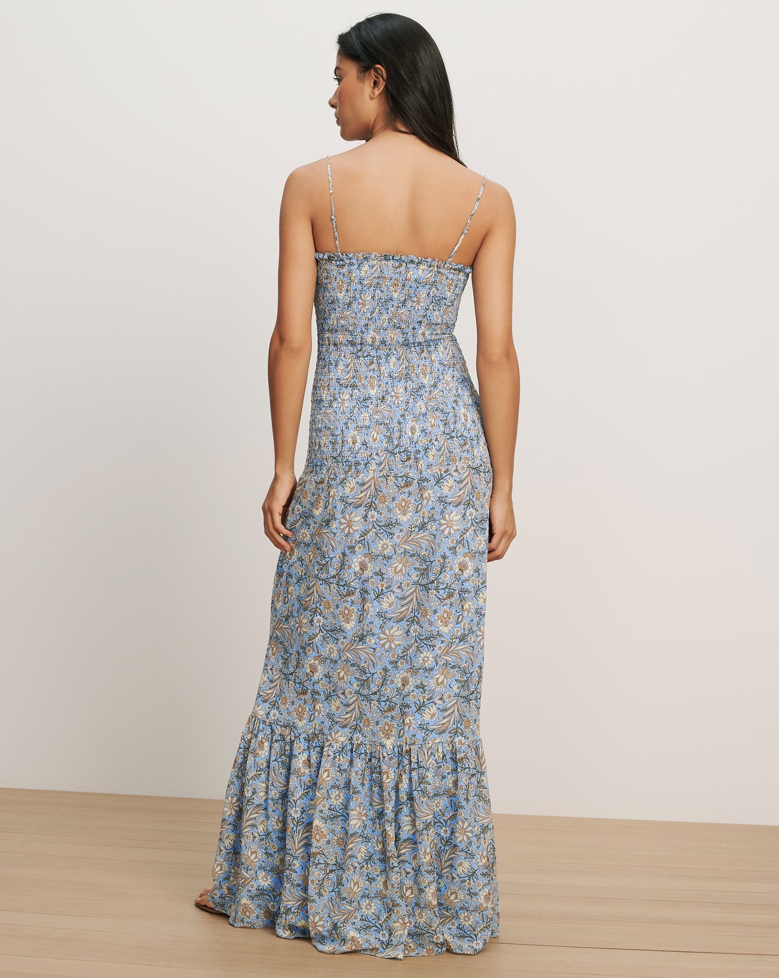 Veronica Beard Blue floral print maxi dress with spaghetti straps, a shirred bodice, and a ruffled hem.