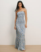 Veronica Beard Light blue floral smocked strapless maxi dress with a ruffled hem.