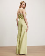 Veronica Beard Lime green satin camisole with lace trim and matching wide-leg pants.