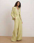 Veronica Beard Lime green linen double-breasted blazer and matching pleated pants.
