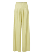 Veronica Beard Light green satin camisole with lace trim and matching wide-leg pleated trousers.