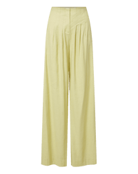 Veronica Beard Light green satin camisole with lace trim and matching wide-leg pleated trousers.