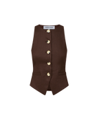Veronica Beard Brown sleeveless button-front vest and black floral midi skirt.