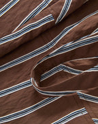 Veronica Beard Brown and white striped linen crop top with a sweetheart neckline and matching brown linen shorts.