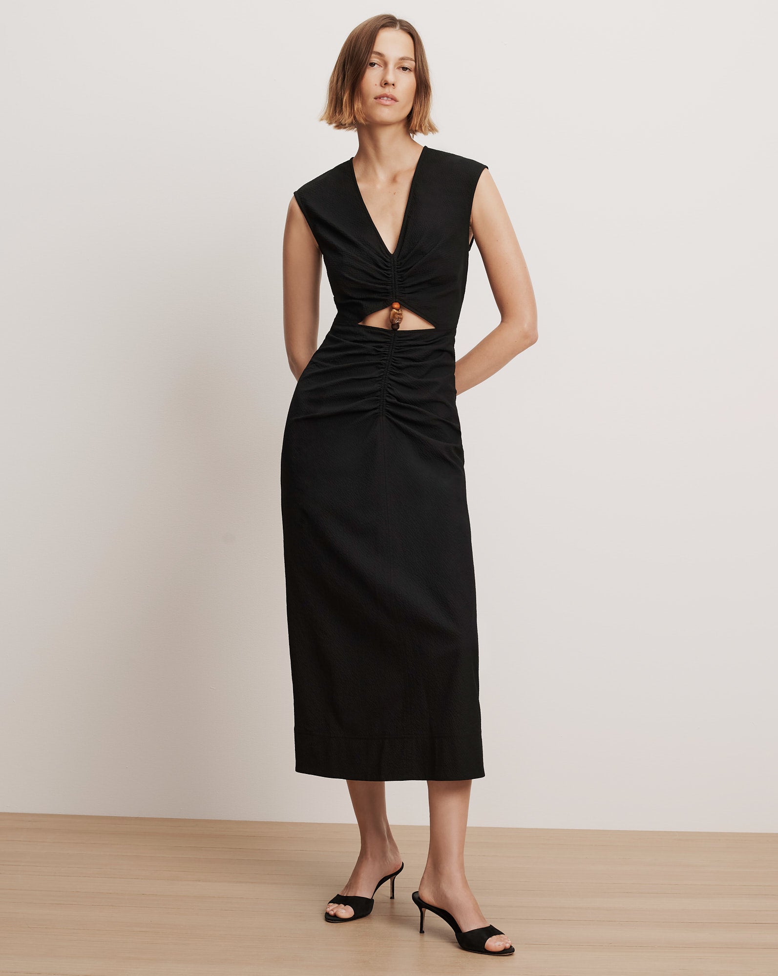 Veronica Beard Black midi dress with ruched cutout and wooden