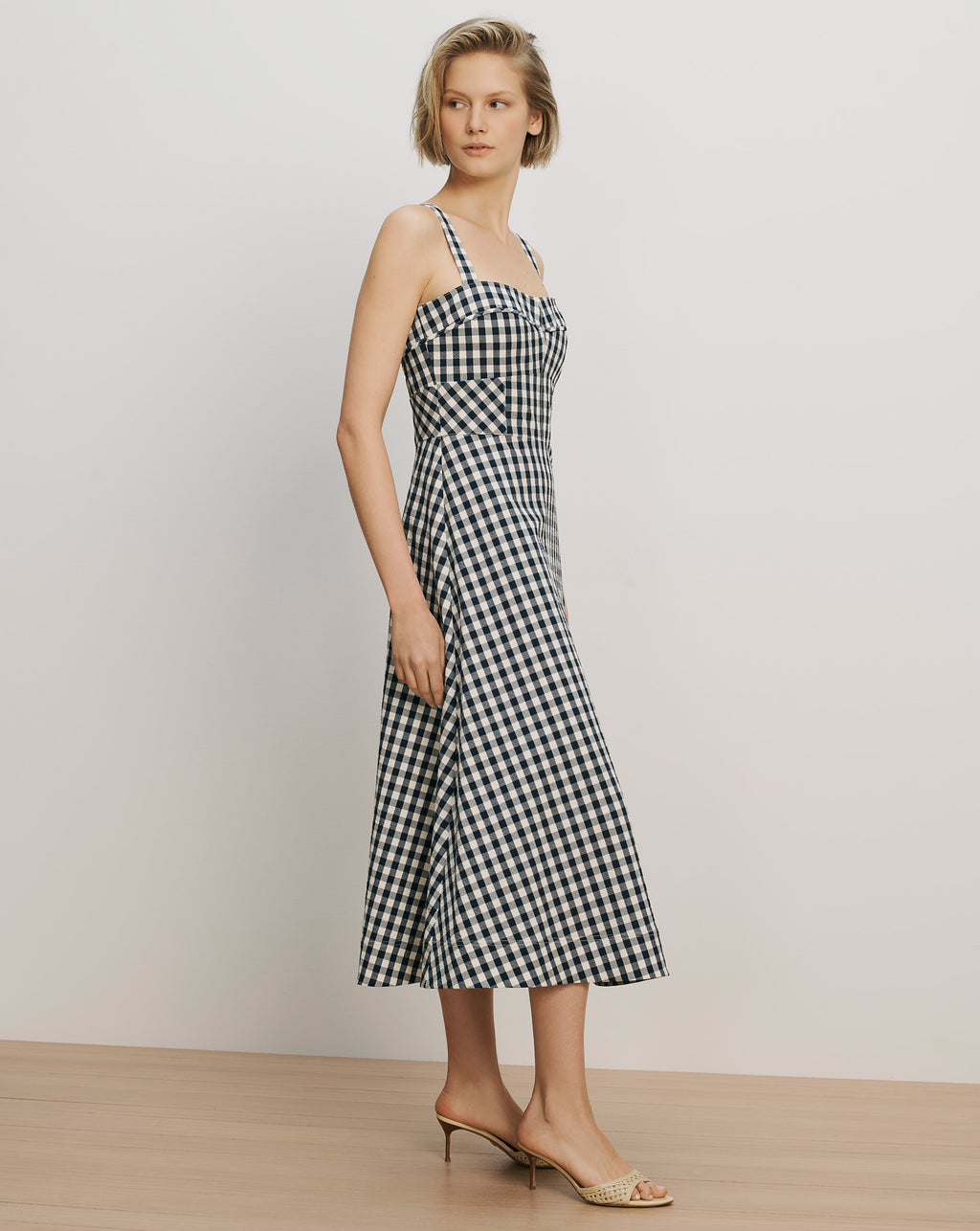 Veronica Beard Black and white gingham midi dress with spaghetti straps.