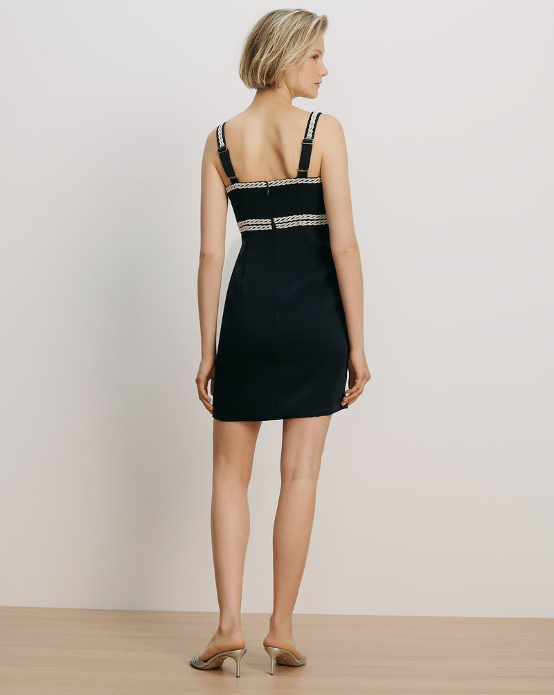 Veronica Beard Black mini dress with braided straps and waist trim.