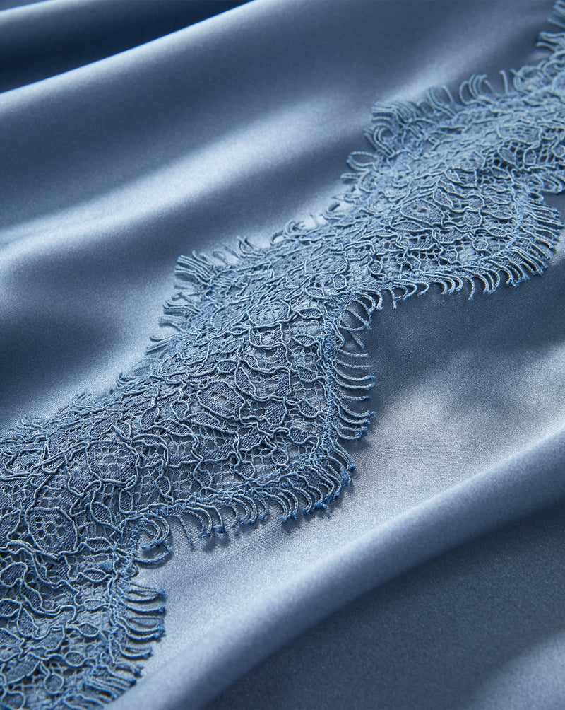 Veronica Beard Blue satin dress with intricate lace trim.