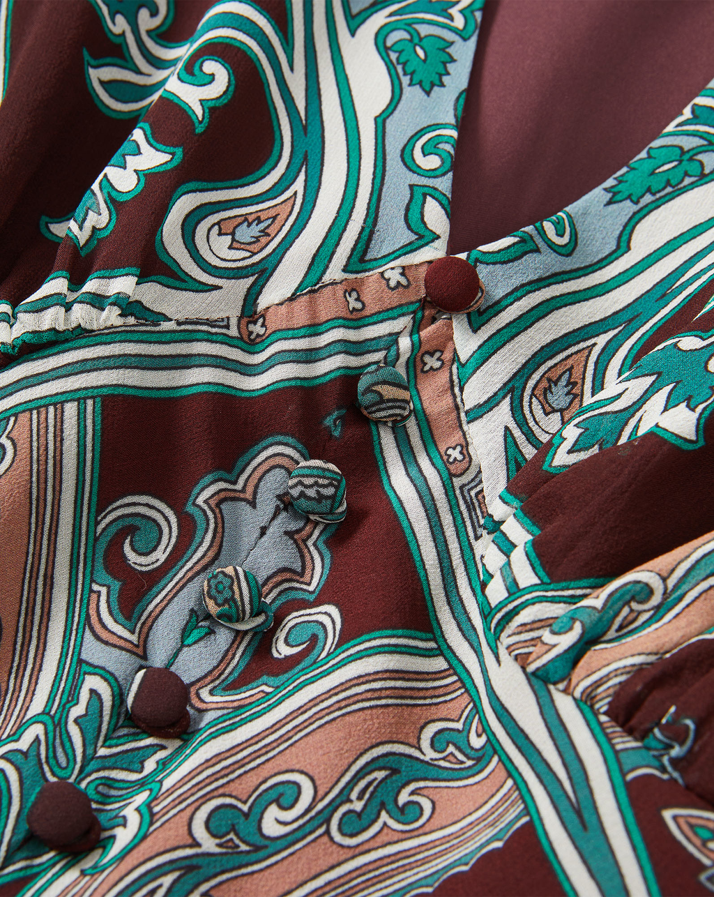 Veronica Beard Brown paisley print blouse with button details.