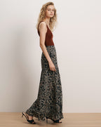 Veronica Beard Brown knit tank top and black paisley maxi skirt.