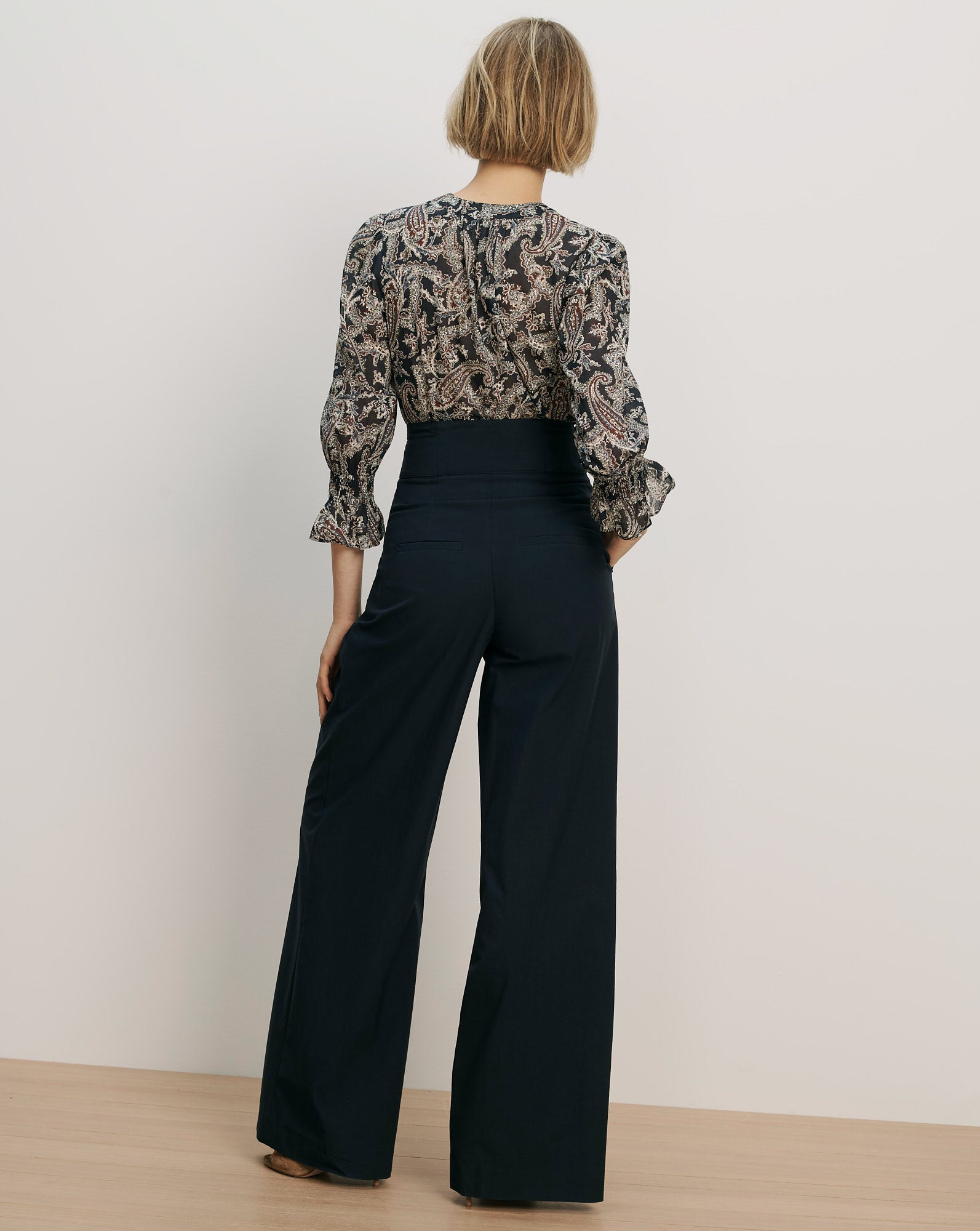Veronica Beard Paisley print blouse with ruffled cuffs.
