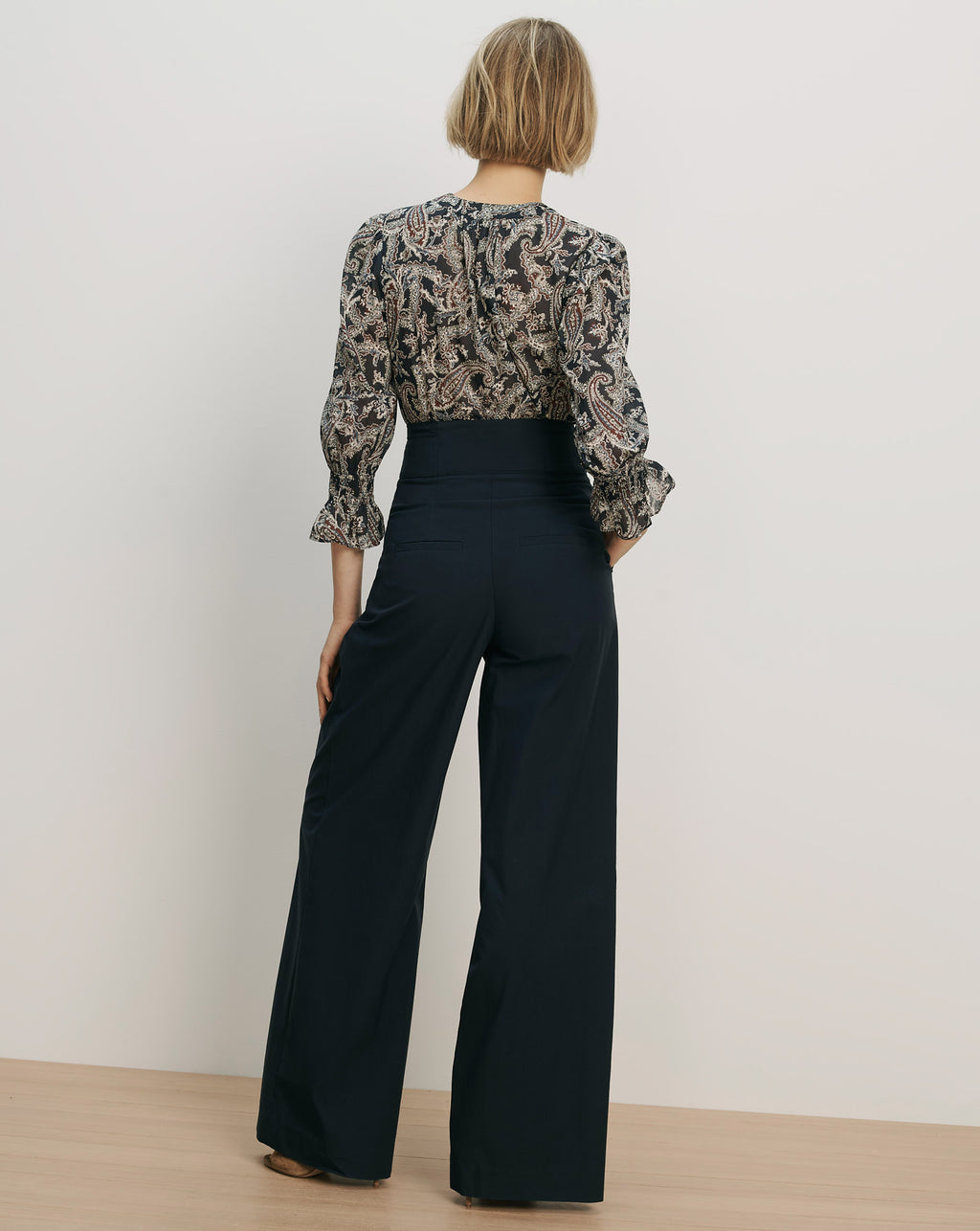Veronica Beard Black wide-leg high-waisted pants.