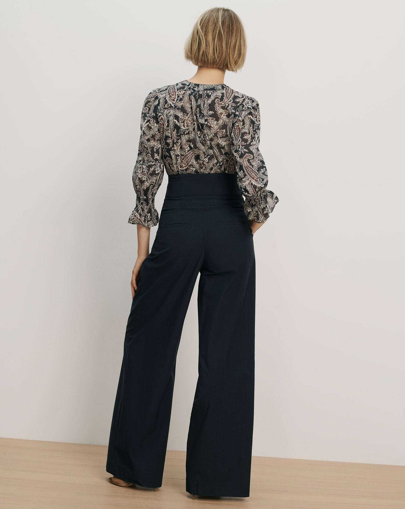 Veronica Beard Black wide-leg high-waisted pants.