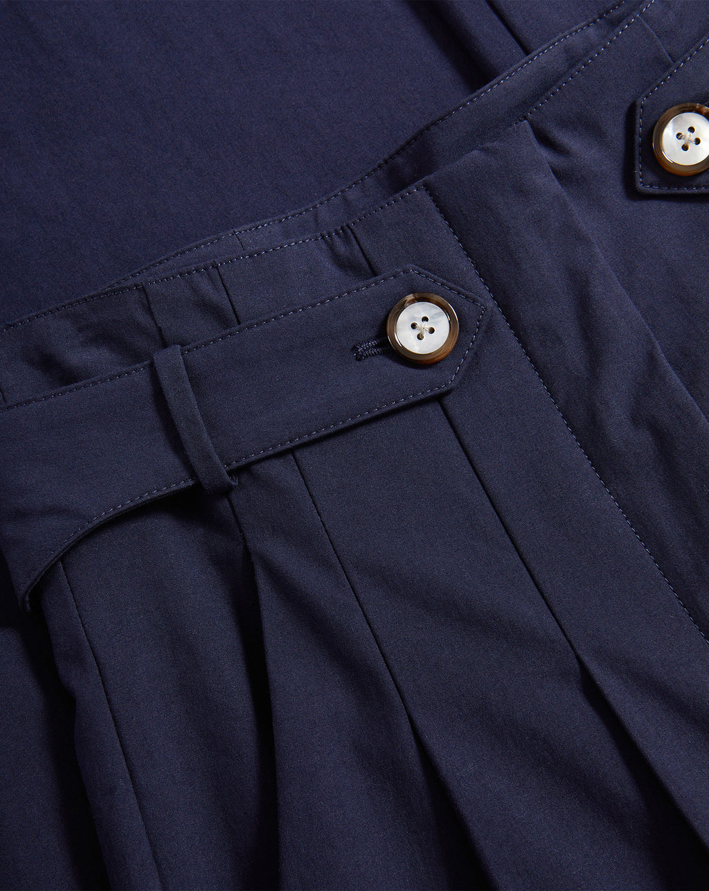 Veronica Beard Navy pleated pants with buttoned belt loops.
