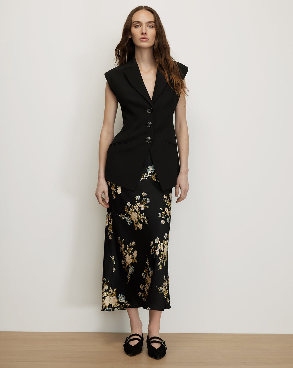 Veronica Beard Black vest, tailored, sleeveless, with two buttons.