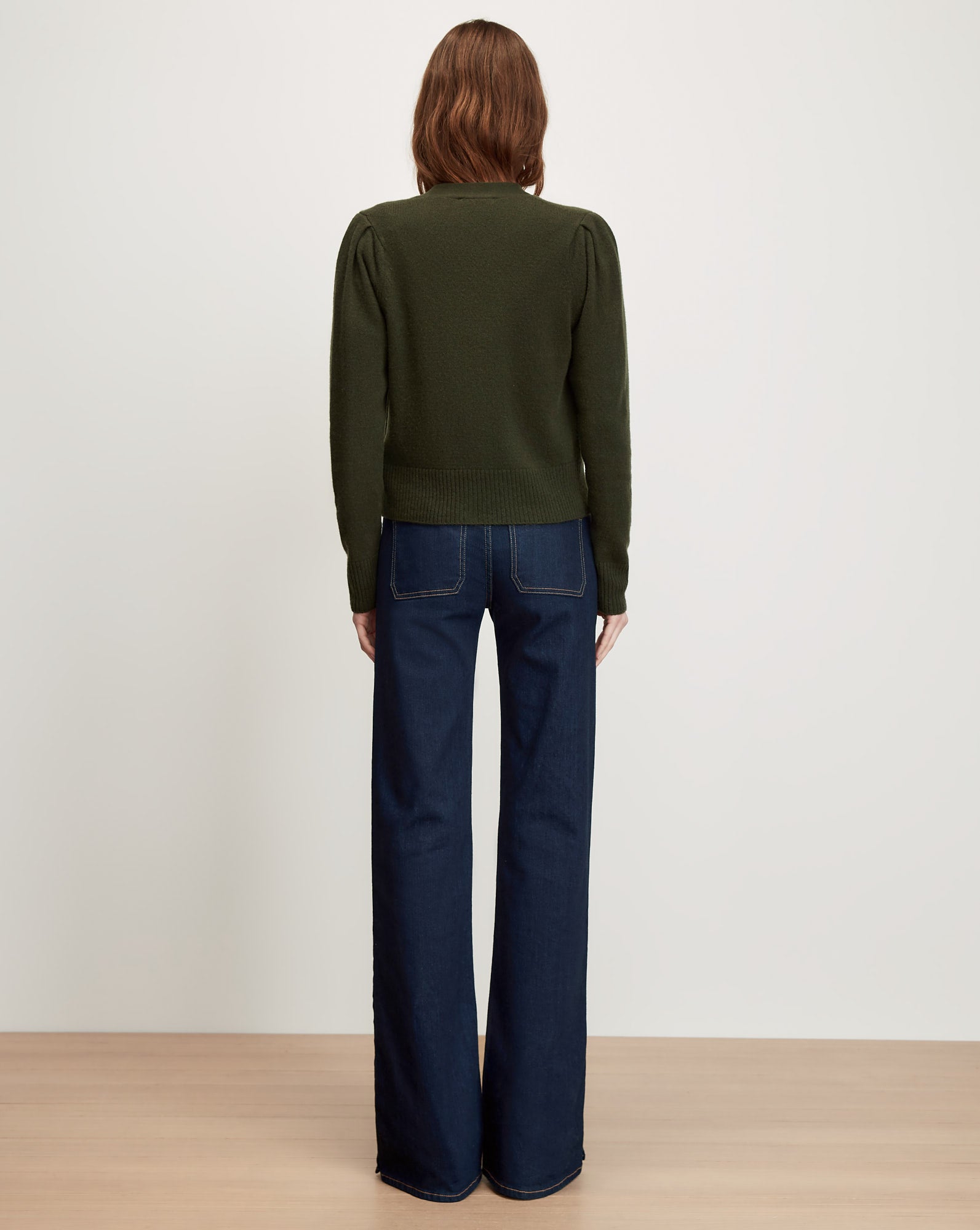 Veronica Beard Green knit sweater with puff sleeves.