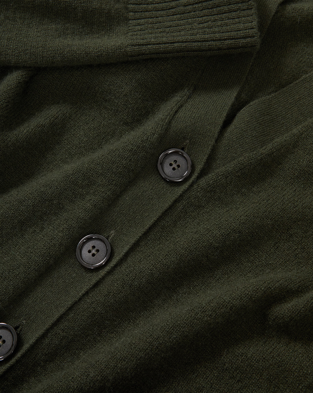 Veronica Beard Dark green cardigan with black buttons.
