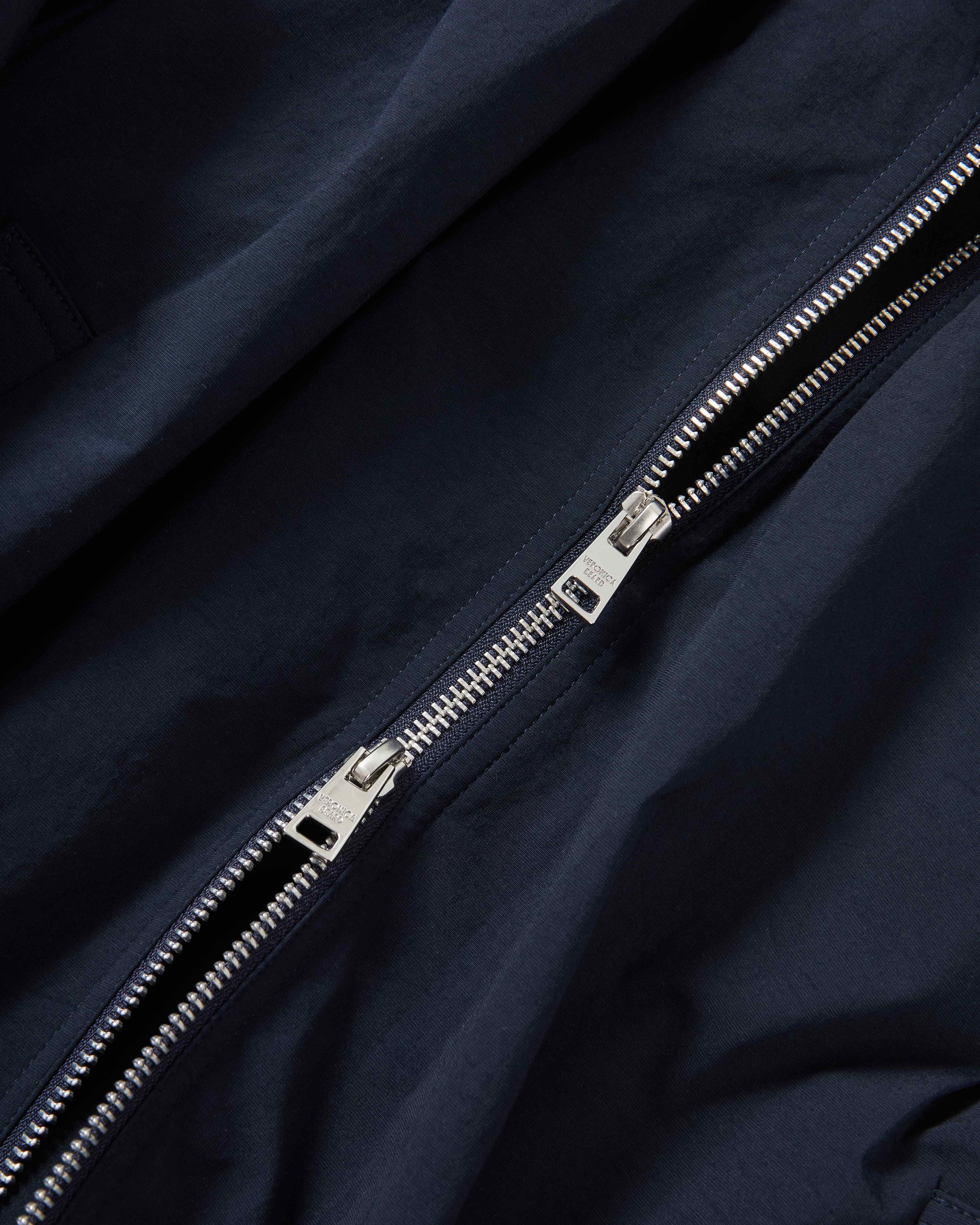 Veronica Beard Navy blue nylon jacket with silver zipper.