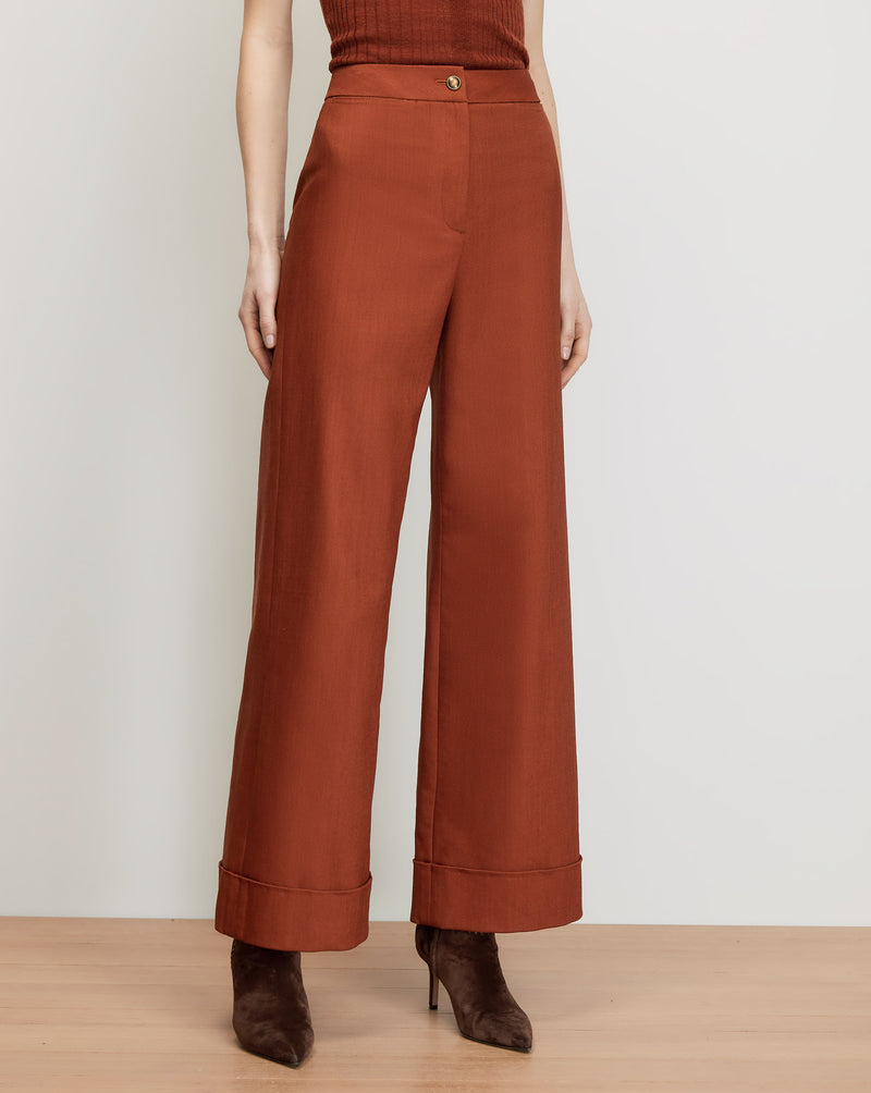 Veronica Beard Brown wide-leg trousers with cuffed hems.