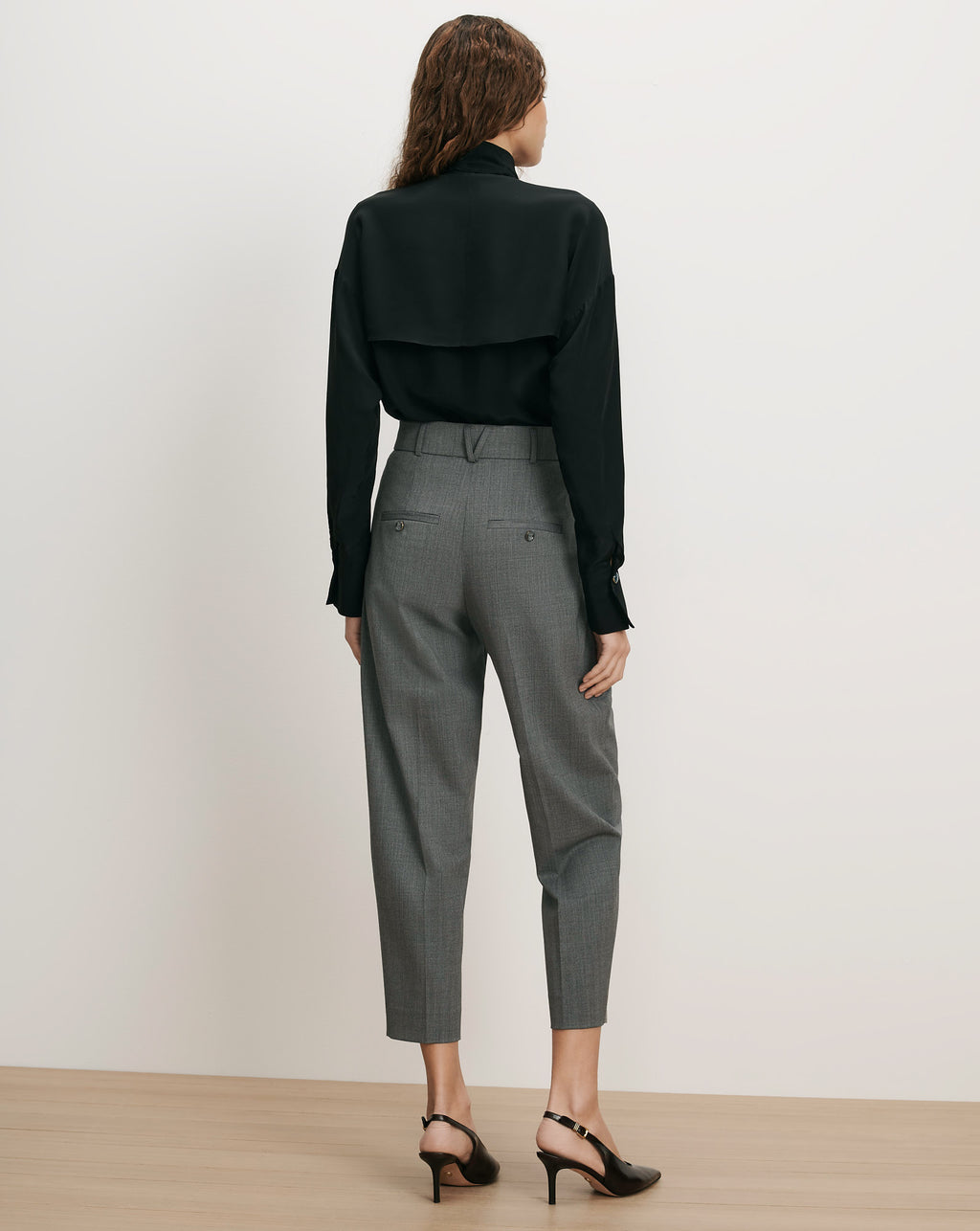 Veronica Beard Black silk blouse, gray wool trousers