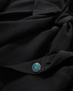 Veronica Beard Black silk blouse with teal button.