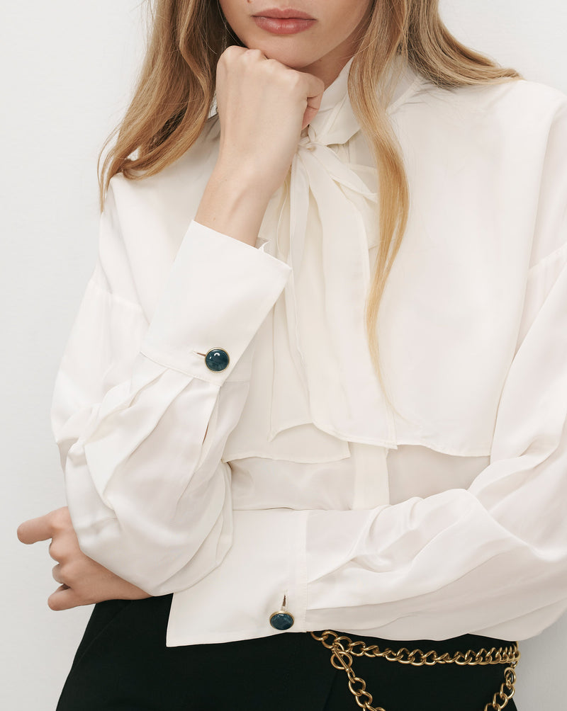 Veronica Beard White silk blouse with pussy bow and cuff buttons.