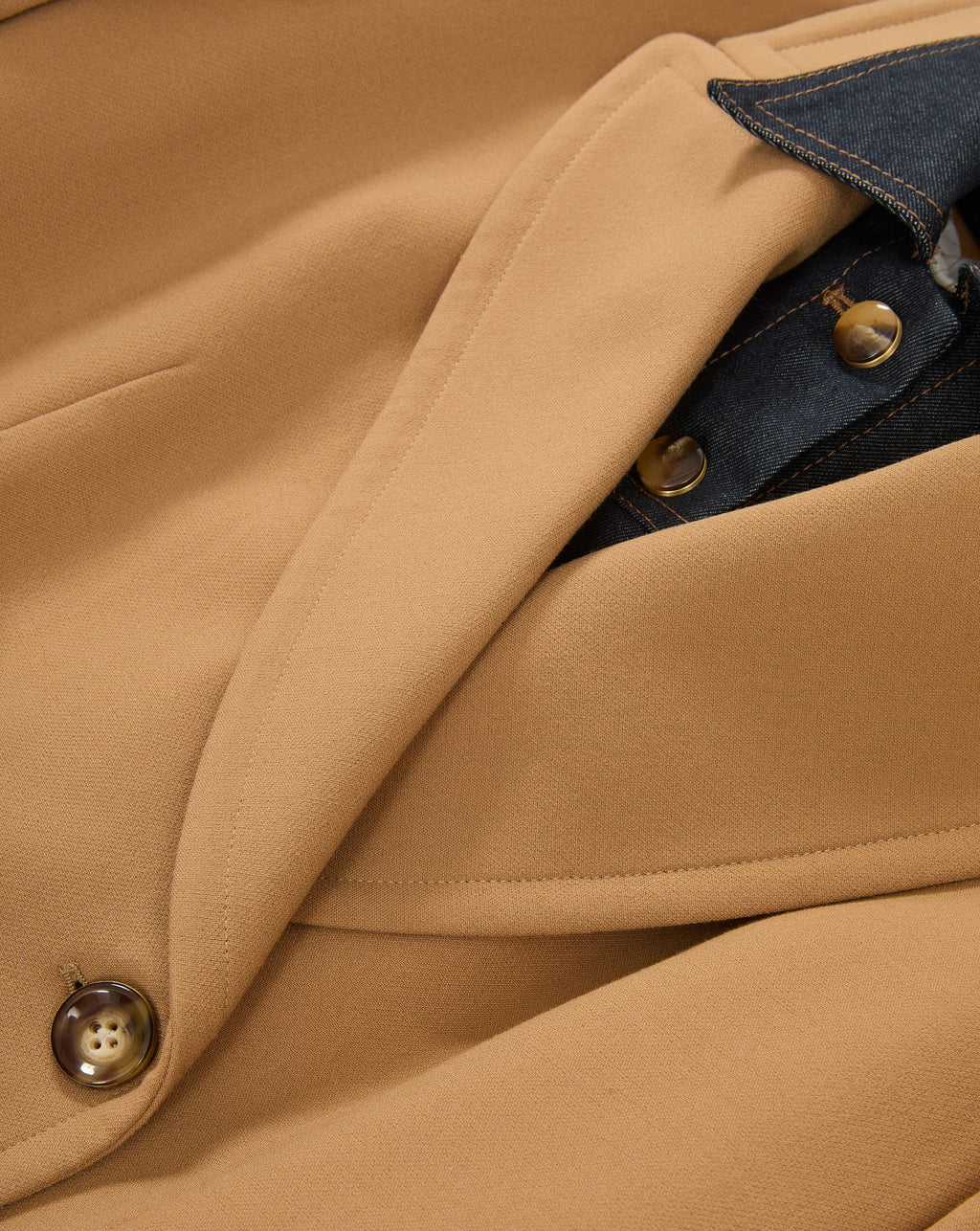 Veronica Beard Tan blazer with dark denim collar and brown buttons.