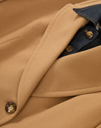 Veronica Beard Tan blazer with dark denim collar and brown buttons.