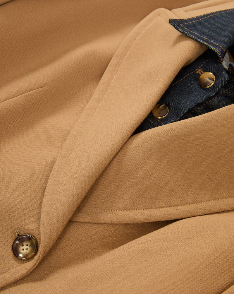 Veronica Beard Tan blazer with dark denim collar and brown buttons.