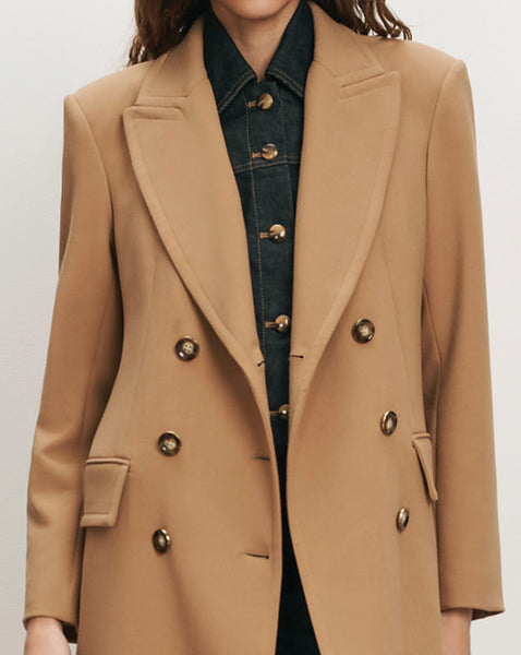 Veronica Beard Tan double-breasted blazer with gold buttons.