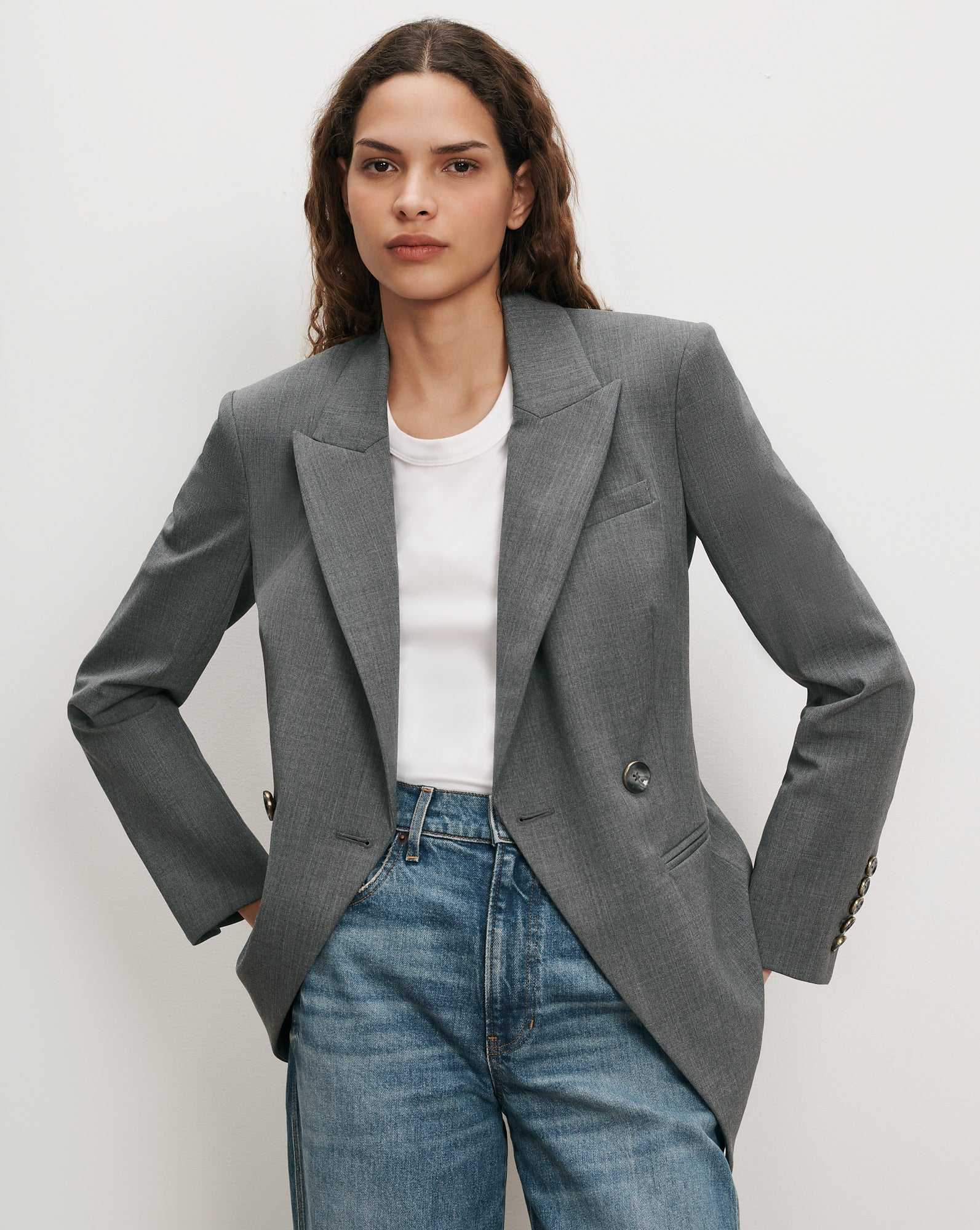 Veronica Beard Gray blazer, white t-shirt, blue jeans.