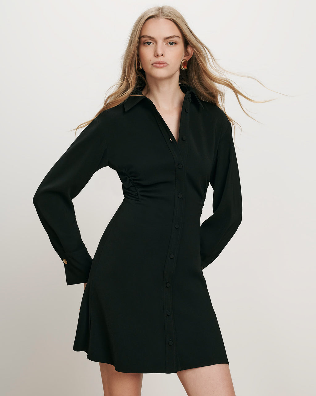 Veronica Beard Black shirtdress with ruched waist and buttoned cuffs.