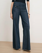 Veronica Beard Blue pinstripe wide-leg trousers with gold buttons.