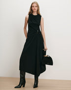 Veronica Beard Black sleeveless midi dress with gold button detail.