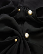 Veronica Beard Black blouse with gold and pearl buttons