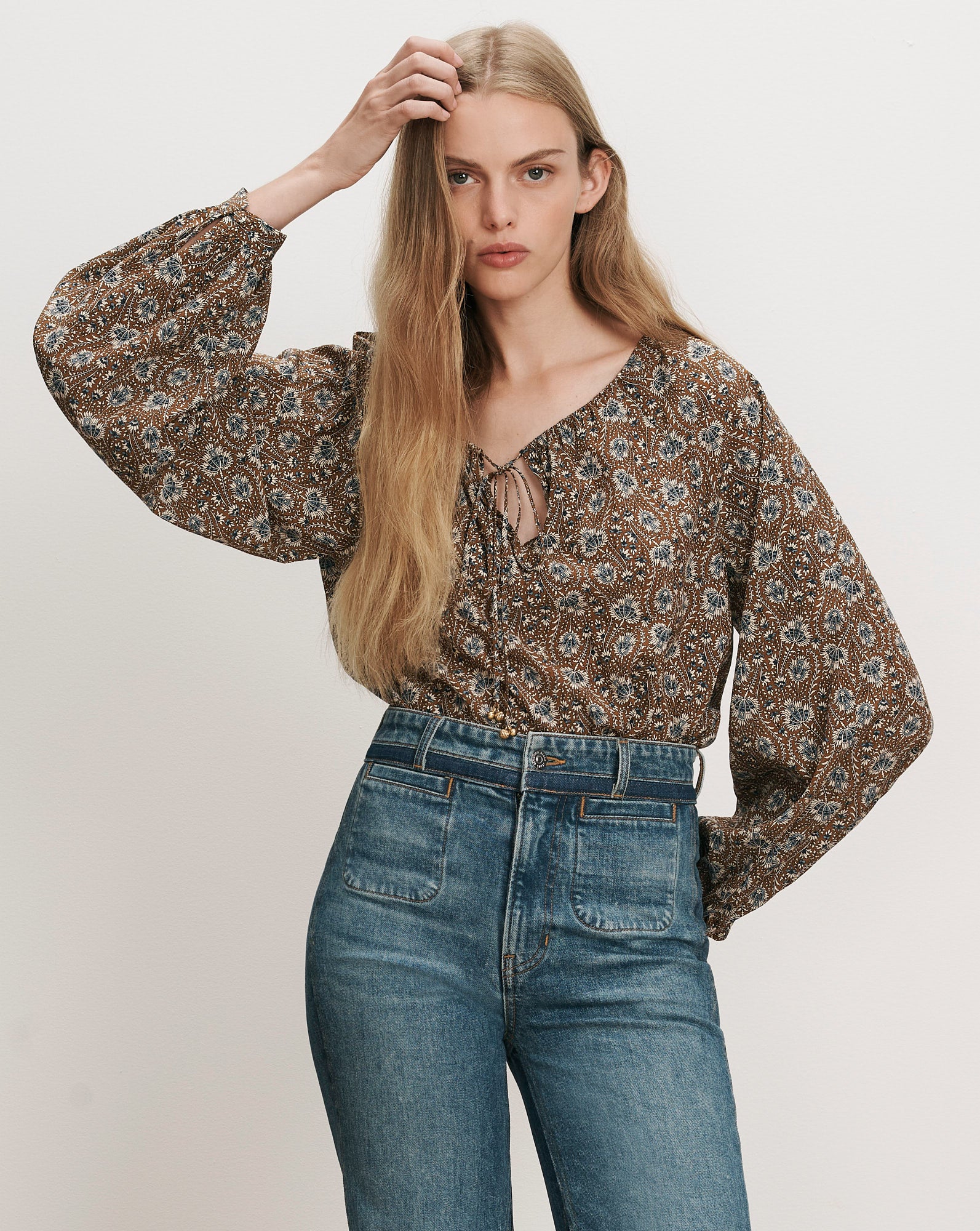 Veronica Beard Brown floral peasant blouse, blue jeans.