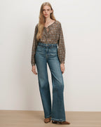 Veronica Beard Brown floral blouse, blue wide-leg jeans