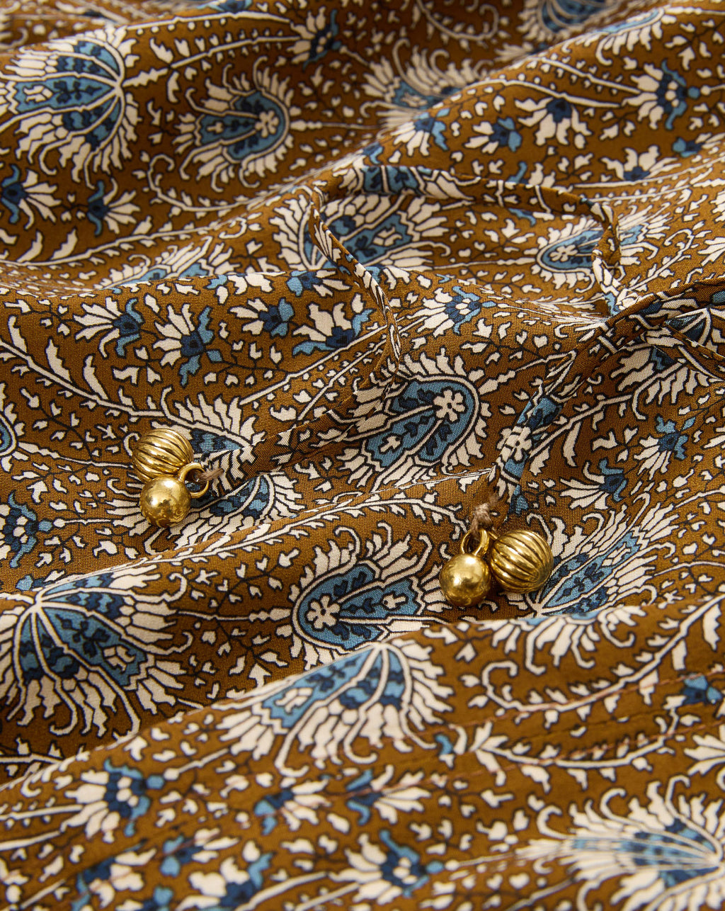 Veronica Beard Brown and blue floral print fabric with gold beads.