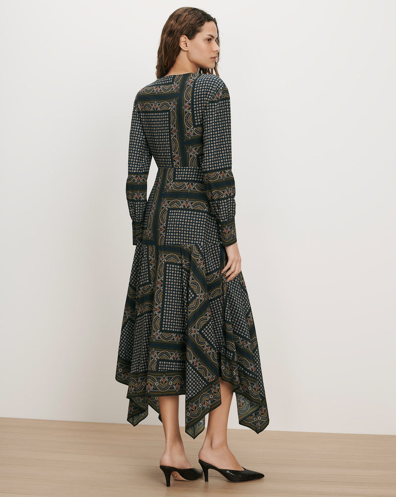 Veronica Beard Green patterned midi dress with long sleeves.