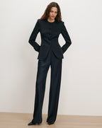 Veronica Beard Navy satin suit with button-front jacket and wide-leg pants.