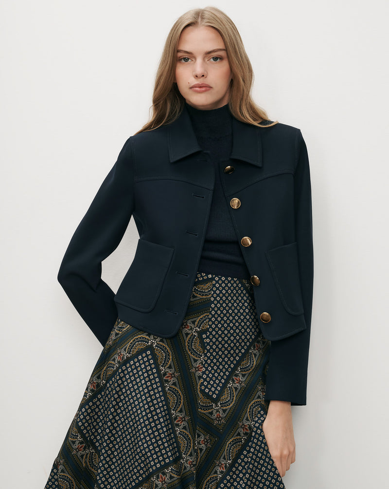 Veronica Beard Navy blue jacket with gold buttons.