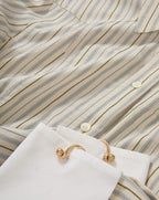 Veronica Beard Striped button-up shirt with white cuffs and gold cuff links.